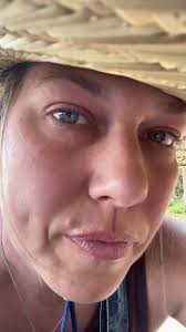 Old Women That Works in The Yard and Wears Overalls