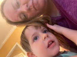 Three year old loves to rub hair