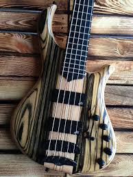 Black And White Ebony Fretboard Timeline Photos Mayones Guitars Basses Guitar Bass Guitar Electric Bass