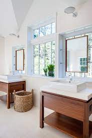 Notice how the before space appears small and rather dingy, largely due to an undersized (translation: Boston Mirror Furniture Pier 1 Bathroom Contemporary With Windowsill Square Sinks Window