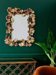 Clip photos to the fairy lights with wooden clothespins, and add some decorations that match the theme of your photos. 10 Unique Wall Decor Ideas To Decorate Your Abode Goodhomes Co In