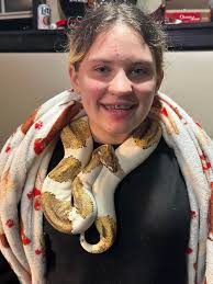 hi i hope that this is okay to post i've had my royal python for around 2  years now and lately ive noticed some of her scales feel really loose and  crispy