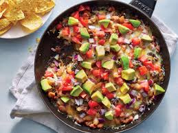 These loaded nachos are piled high with chips, beef, beans, cheese, pico de gallo, and avocado. 15 Healthy Nacho Recipes Cooking Light