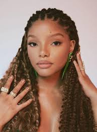 Halle Bailey Wearing Gavi Spicule Earrings In Green Leopard Enamel Finish