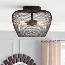 The mirrored backplate completes the look of this contemporary chandelier. Pin By Tess Camp On Creative Lighting In 2021 Black Ceiling Lighting Flush Mount Flush Mount Ceiling Lights