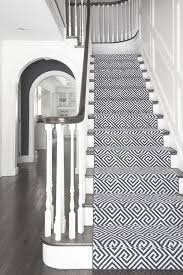 Black And White Herringbone Stair Runner Tips For Installing Stair Runners In Your Home House Entrance Geometric Stair Runner Beautiful Stairs
