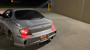 Image result for Wildberry Red 1999 Tiburon