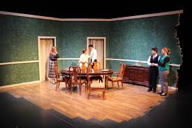 In some ways, the dining room table and chairs become a character in this play. The Dining Room Scenic Design