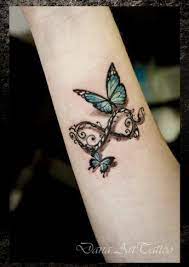 Pin By U Geg Mila On Tattoos Tattoos For Daughters Butterfly Tattoos For Women Butterfly Wrist Tattoo