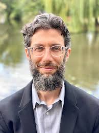 Aaron Koller joins AMES