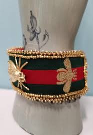 Gucci Inspired Fly And Bee Bead Embroidered Cuff Behold Jewelry Designs West Hartford Ct Le logo gucci appartient à la maison gucci, plus souvent connue comme gucci. gucci inspired fly and bee bead embroidered cuff
