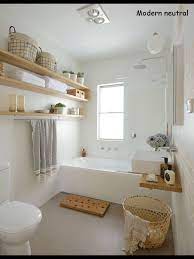 From small bathroom designs using tile and wallpaper, to help decide on a small see all our small bathroom design ideas on house by house & garden including this grey bathroom with clock above the bath. Modern Neutral Bathroom From Better Homes And Gardens Australia Bathrooms Remodel Home Bathroom Decor