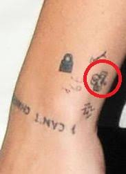 Two swallows face each other on kinds' pecs. Harry Styles 52 Tattoos Their Meanings Body Art Guru