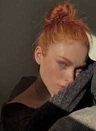 I used to think being born with red hair was weird, but now I love my hair.