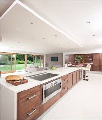 Modern kitchen interiors modern kitchen cabinets modern kitchen design home decor kitchen new kitchen kitchen ideas smart kitchen stylish beautifully updated tudor kitchen with custom walnut cabinets and lacanche range. 8 Stylish Luxury Kitchens Real Homes Walnut Kitchen Modern Walnut Kitchen Walnut Kitchen Cabinets
