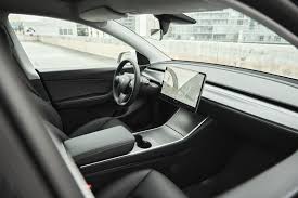 The tesla model y is an electric compact crossover utility vehicle (cuv) by tesla, inc. 2021 Tesla Model Y Interior 001 Clavey S Corner