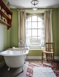 Modernize an earthy green paint color by including dark and light counterpoints in the room. Green Paint Ideas House Garden