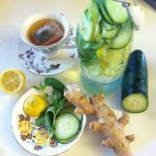 Flat Belly Infused Water With Cucumber Ginger Mint And Lemon Cucumber Detox Water Homemade Detox Juicing Recipes