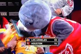 The houston rockets mascot tried to distract a free throw shooter with a green man popping out of a garbage can at last night's game. The Houston Rockets Mascot Got A Little Overzealous With The Old Cake Gag On Tuesday Night Video Total Pro Sports