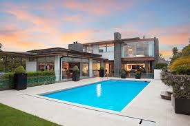 20 Sublime Contemporary Swimming Pool Designs You Ll Want To Dip In Indoor Outdoor Pool Cool Swimming Pools Swimming Pool Designs