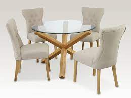 The table and chairs are very sturdy! Lpd Oporto 120cm Glass Round Dining Table And 4 Naples Chairs Set