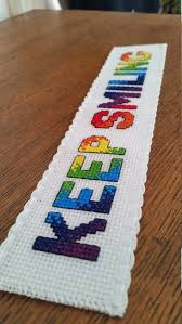 The cover side includes a full color photo of the stitched bookmark. Pin On Cross Stitch