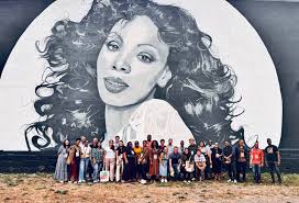 Larger-than-life Disco Queen Donna Summer is now immortalized forever in  the city she grew up in with a larger-than-life black-and-white mural along  the side of Black Market in Roxbury's Nubian Square. Artist