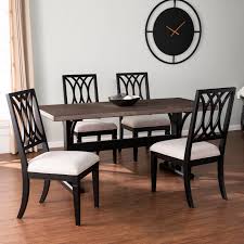 Modern farmhouse dining chairs under 100 decor on the. The Gray Barn Bian Modern Farmhouse Black Wood Dining Set Set Of 5 Overstock 30742479