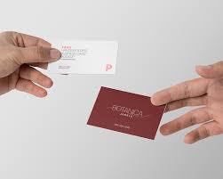 This visiting or business card mockup helps in branding your corporate business identity in the market. Free Hands Holding Business Card Mockup Creativetacos