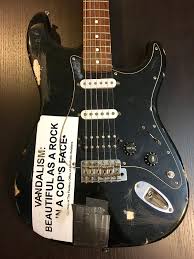 Vandalism Beautiful As A Rock In A Cops Face Sticker Fender Vandalism Stratocaster Kurt Cobain Black Godfathers Guitars Reverb In 2020 Kurt Cobain Guitar Fender