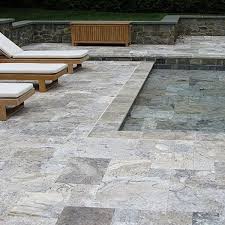 Classic travertine pool coping drop down (rebate). French Pattern Pavers