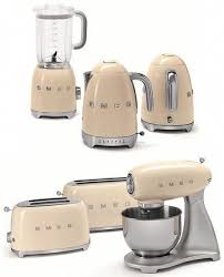 The Smeg First Ever Line Of Small Appliances Is Designed To Match The Famous Retro Style O Retro Kitchen Appliances Retro Appliances Outdoor Kitchen Appliances