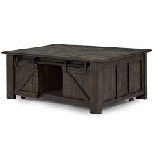 You'll have easy access to everything while keeping it off the tabletop. Garrett Rustic Weathered Charcoal Lift Top Sliding Door Coffee Table With Casters Overstock 13321503