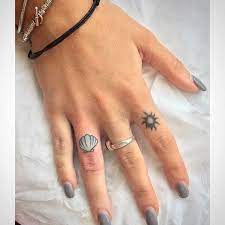 95 Beachy Tattoos That Will Make Your Summer Memories Last Forever Finger Tattoos Beachy Tattoos Tattoos