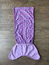 This free crochet pattern for a mermaid tail blanket is super easy to follow with pictures and video tutorial help options to see how diy mermaid tail mermaid tail pattern crochet mermaid tail mermaid tail blanket mermaid mermaid vintage. No Sew Fleece Mermaid Tail Blanket Pattern Cutesy Crafts
