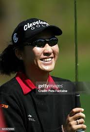 Emilee Klein enjoying practice day at the 2004 Michelob Ultra Open. News  Photo