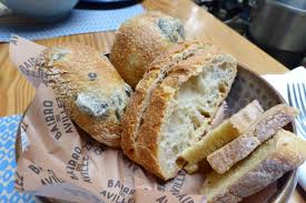Assorted Crusty Breads And Green Olive Rolls Served At Bairro De Avillez In Libson Portugal Food Crusty Bread Bread