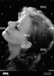 1929 , USA : The actress GRETA GARBO and Lew Ayres in THE KISS ( Il bacio )  by Jacques Feyder , from a novel by George M. Saville