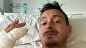 Isle of Man TT rider “hit wall feet first”, explains crash, “lucky to be  here”