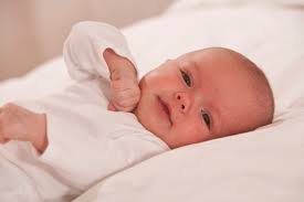 How To Put Baby Into A Crib Without Waking Her Up