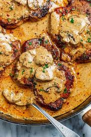 Garlic Pork Chops Recipe In Creamy Mushroom Sauce How To Cook Pork Chops Pork Recipes Pork Dinner Meat Recipes