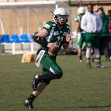 Football alumni continue careers in UK