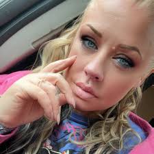 The real estate agent who was found not guilty after being accused of  forging the signatures of three other realtors has reached a settlement  with the Wyoming Real Estate Commission where she