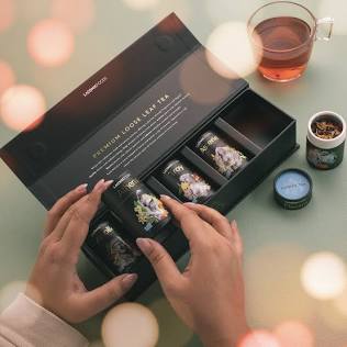 Luxury loose-leaf tea presentation box, AI generated