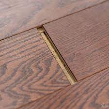 Wood fillers should only be used for woodworking items that will remain indoors, whereas wood putty can be used with projects for any type of environment. How To Fix Floating Floor Gaps Diy Floor Gap Fixer The Navage Patch