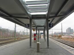Vehicle storage under flyover at the bayarena. Platform Roofing For The New Bahnstadt In Leverkusen Opladen