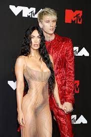 Naked Megan Fox Points a Gun at Machine Gun Kelly's Crotch in First Joint  Magazine Cover | Glamour