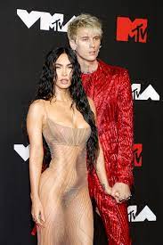 Naked Megan Fox Points a Gun at Machine Gun Kellys Crotch in First Joint  Magazine Cover | Glamour
