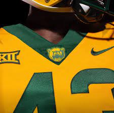 The basketball also keeps their tradition alive of having neon in their uniforms with an alternate grey jersey and neon accents. Baylor Football New Uniforms Uniswag