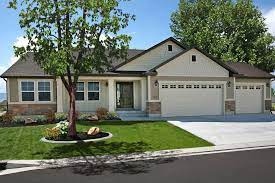 Black gutters and matching accent roofing. Example Of Dark Soffit And Fascia Light Garage And Trim Painted Brick House Exterior House Color House Paint Exterior